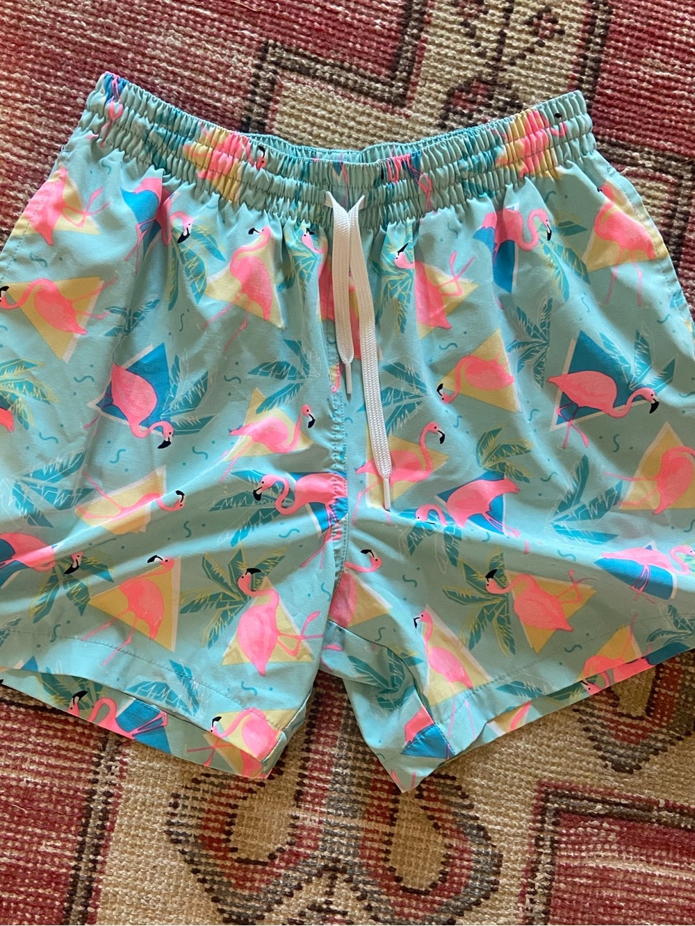 chubbies Light Aqua Swim Shorts with Pink Flamingo Print